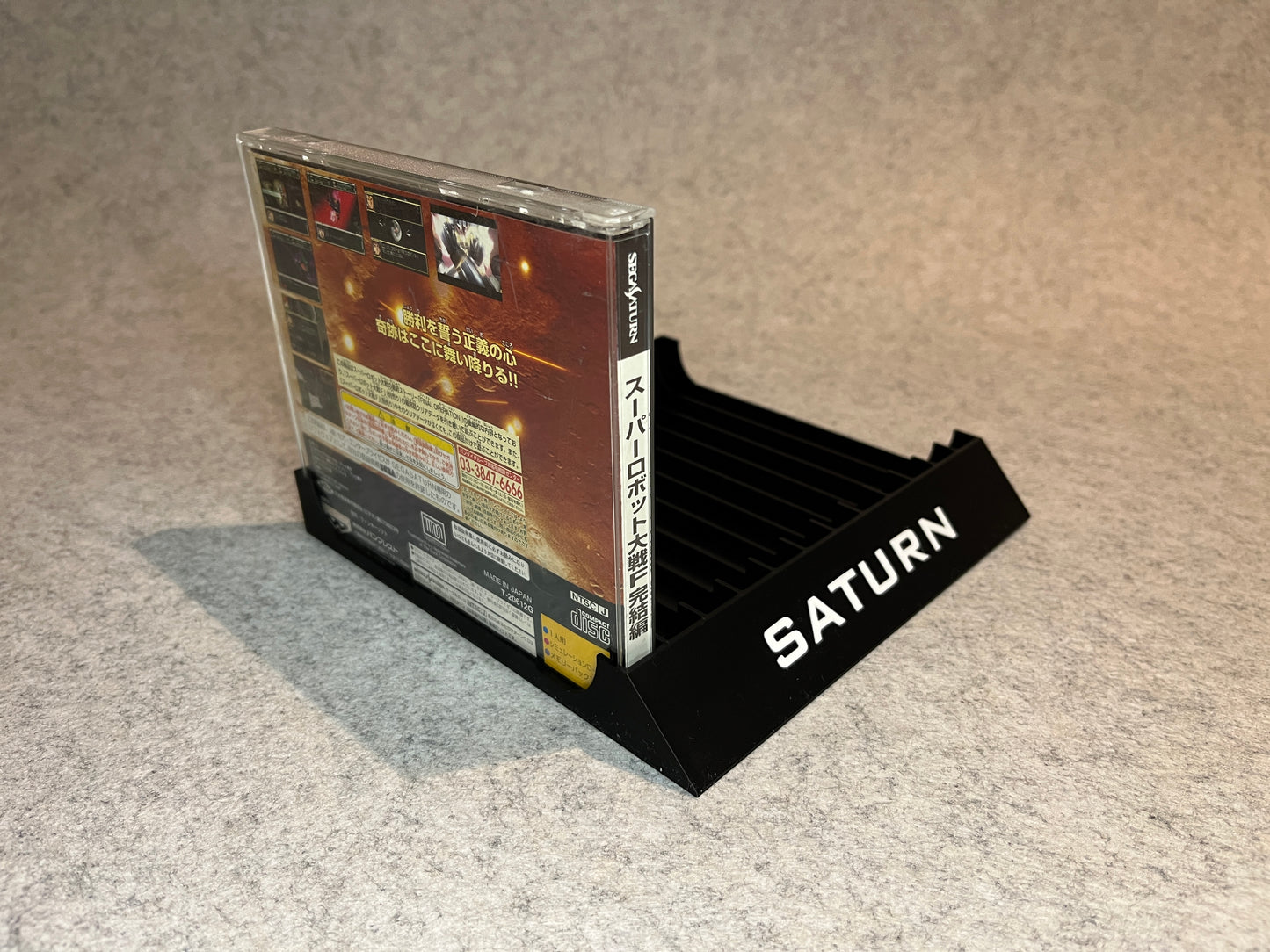 Spelställ för 12 japanska Sega Saturn spel