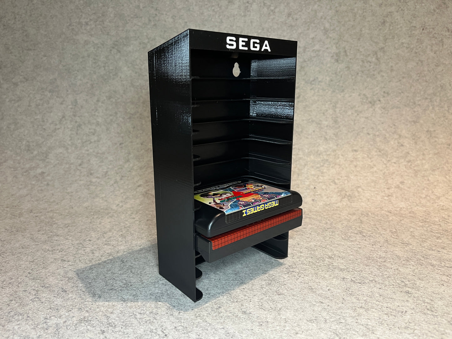 Vägghållare / spelställ för 10 spel till Sega Megadrive / Master System