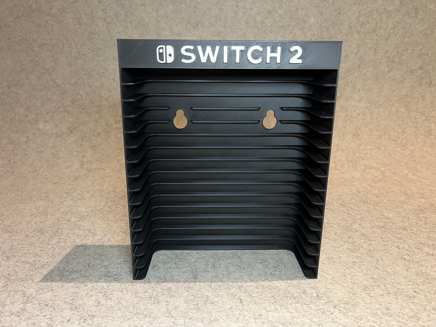 Vägghållare / spelställ för 12 spel till Nintendo Switch 2