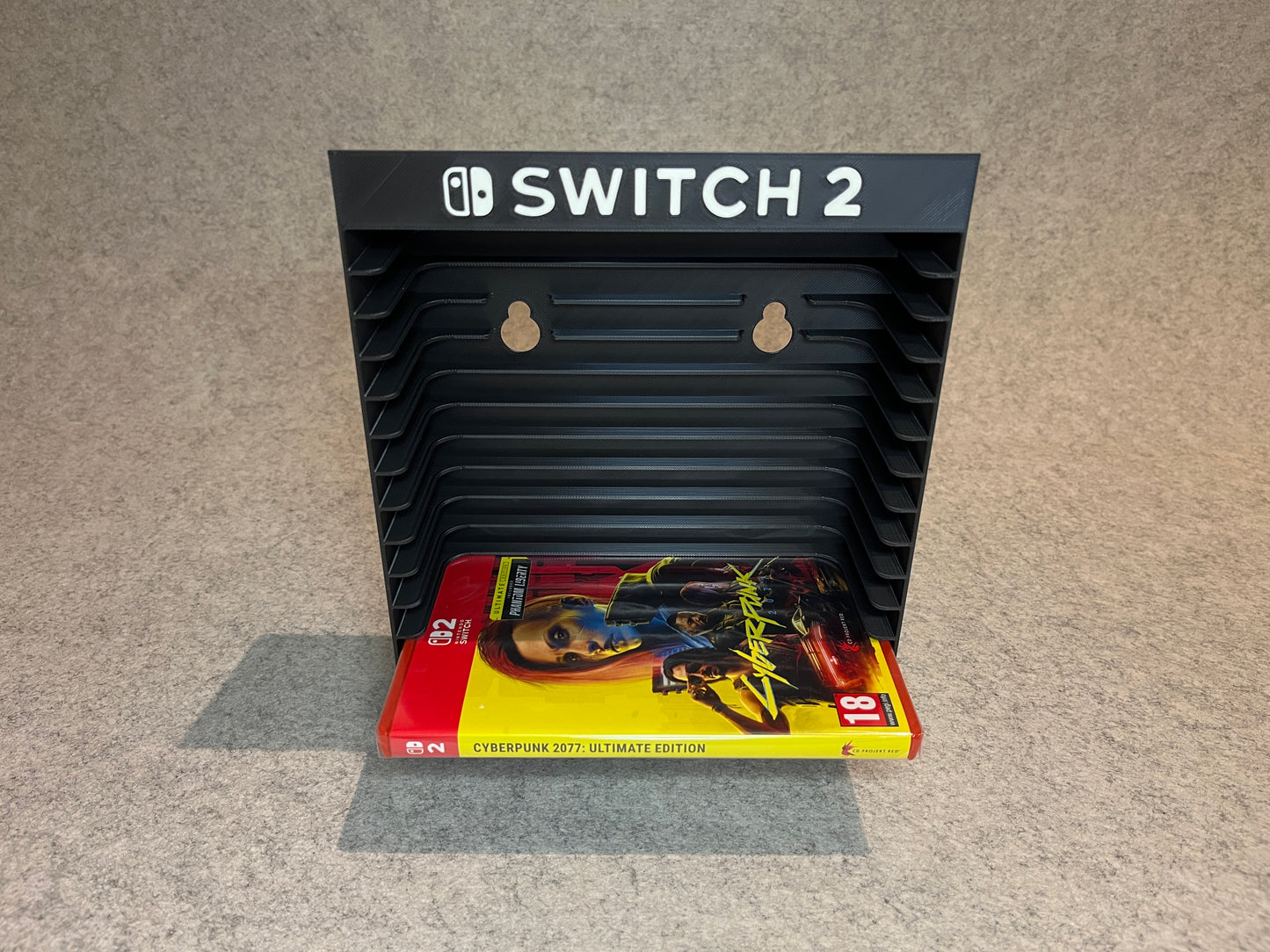 Vägghållare / spelställ för 12 spel till Nintendo Switch 2