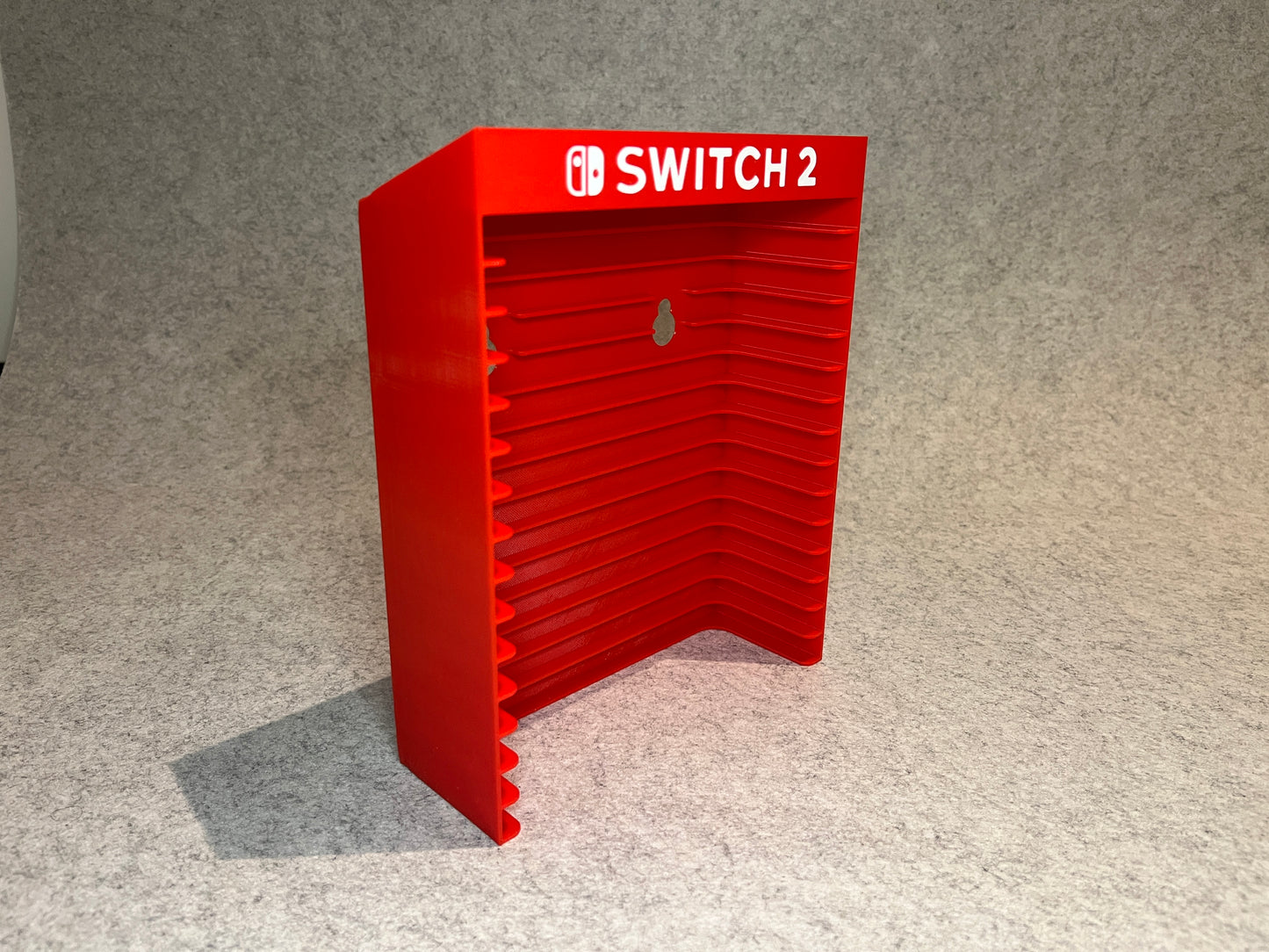 Vägghållare / spelställ för 12 spel till Nintendo Switch 2