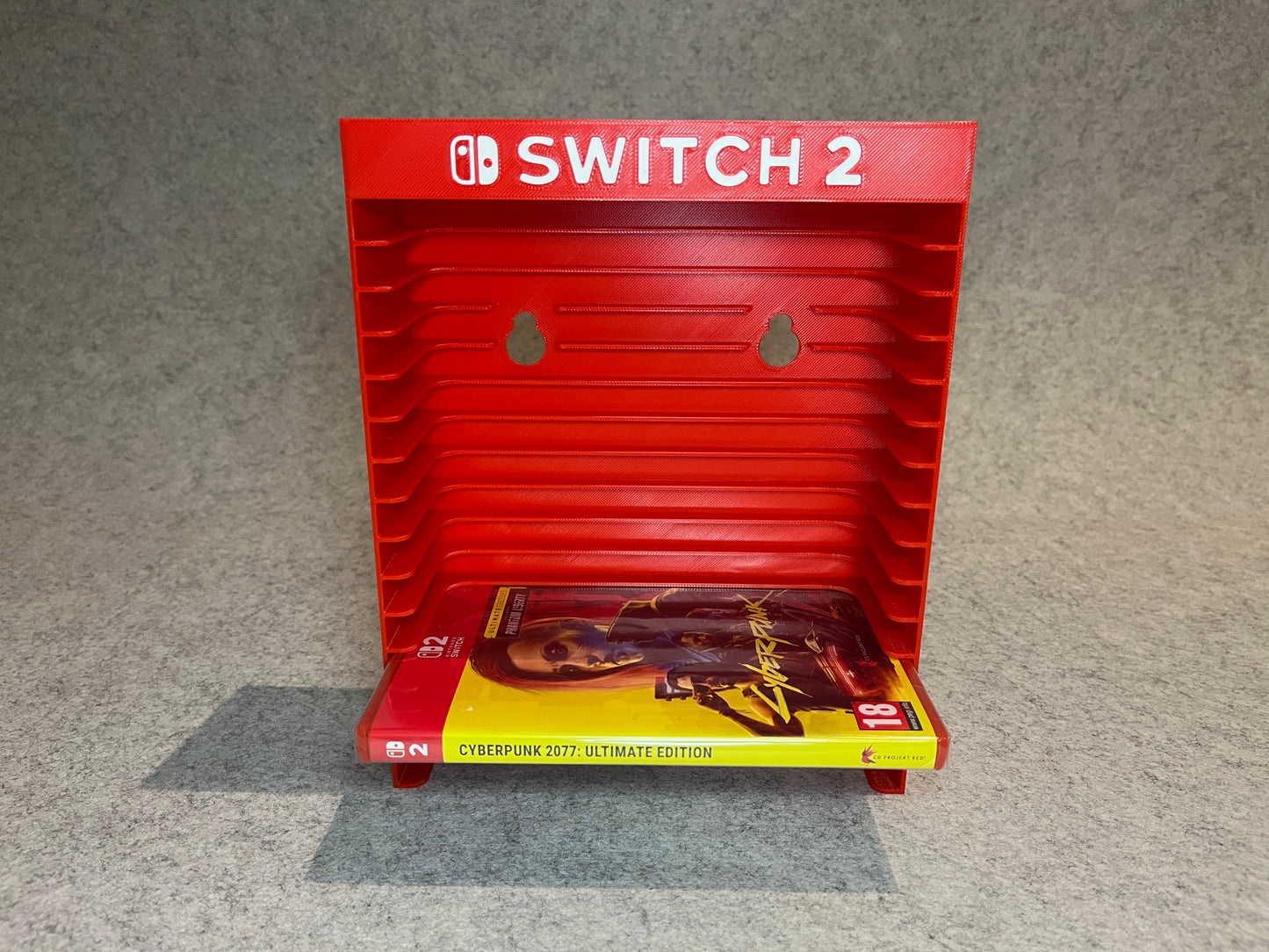 Vägghållare / spelställ för 12 spel till Nintendo Switch 2