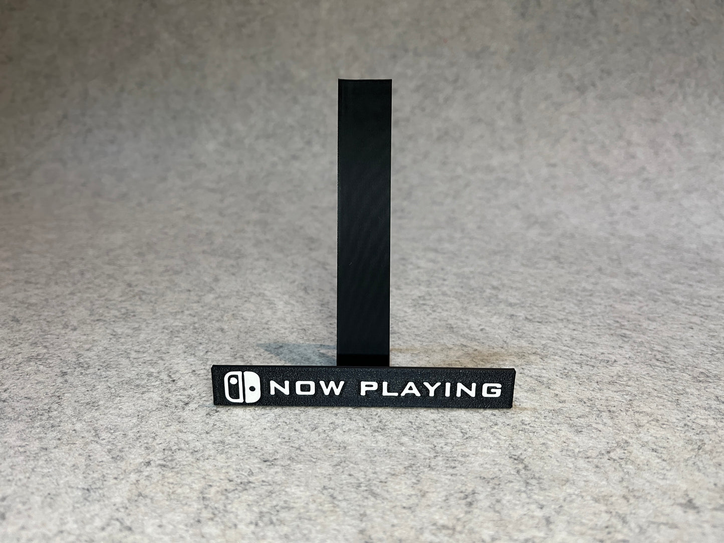 Displayställ för Nintendo Switch 2-spel - „Now Playing”