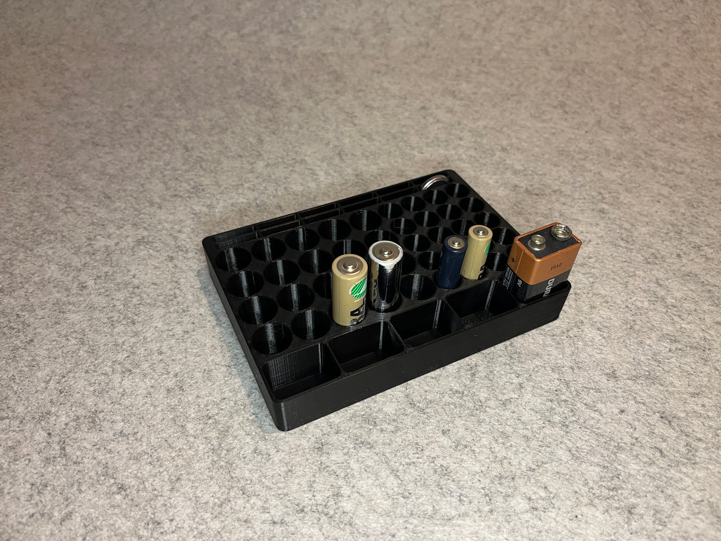Ställ för AA, AAA, 9V och CR2032 batterier