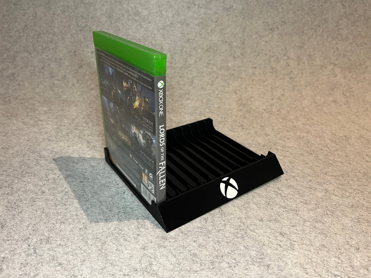 Spelställ för 12 Xbox One / Series X|S-spel med Xbox-loggan
