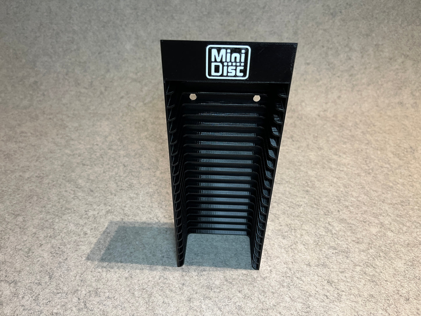 Vägghållare / ställ för 20 MiniDisc MD skivor