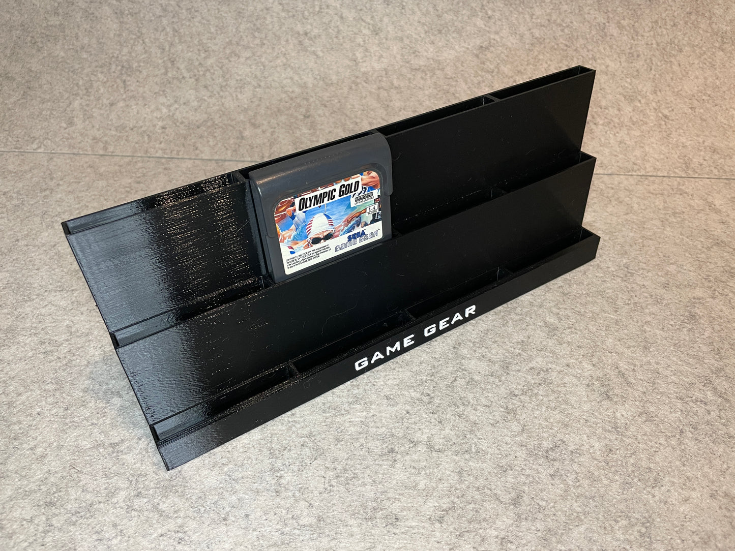 Display spelställ för 12 Sega GameGear spel