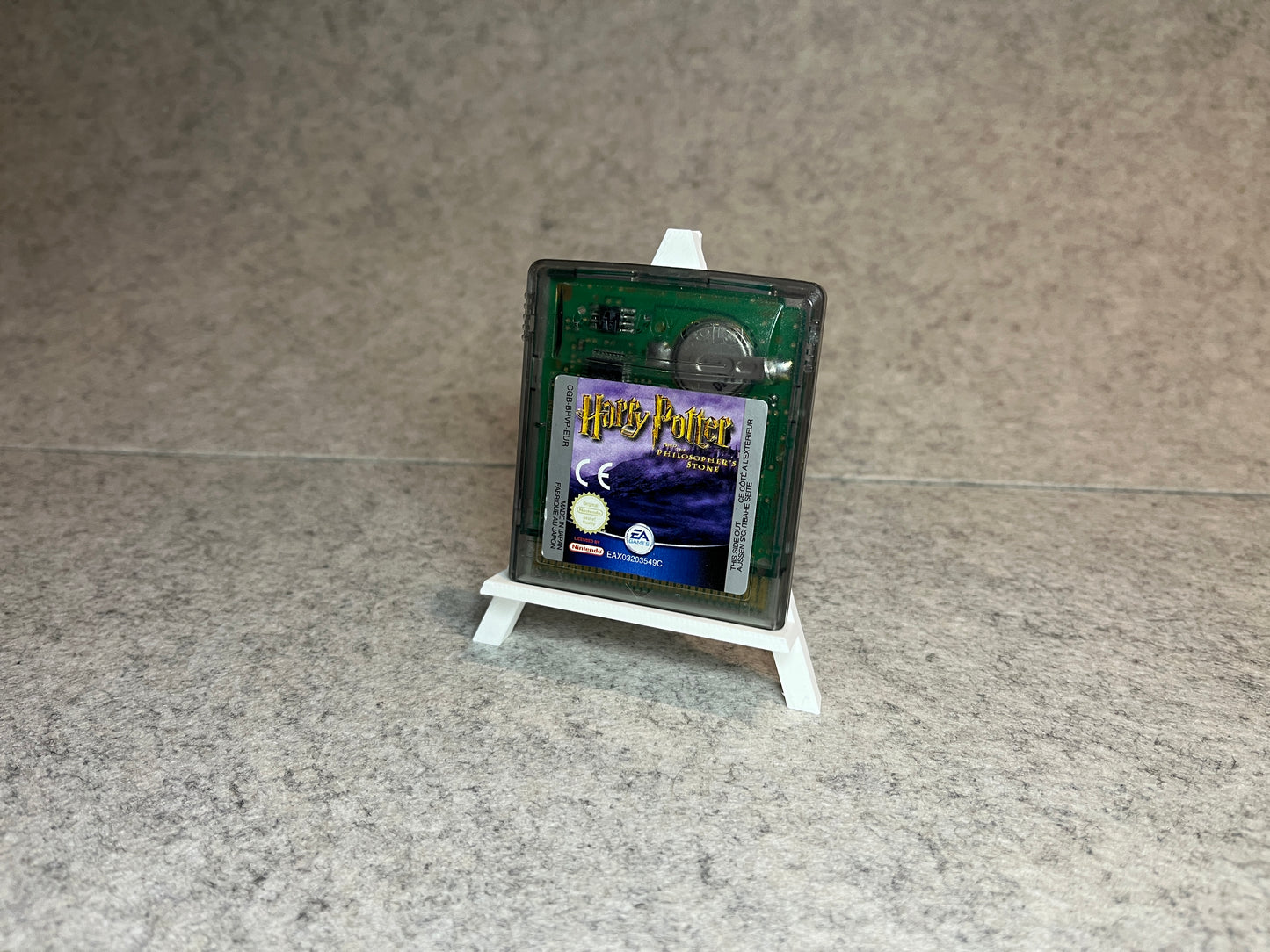 Displayställ (easel) för ett GameBoy spel - enkelt visningsställ