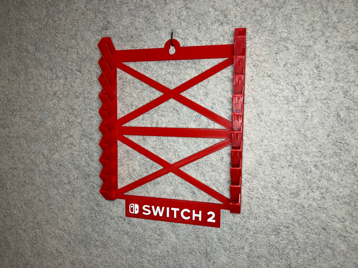 Vägghållare / spelställ för 10 spel till Nintendo Switch 2