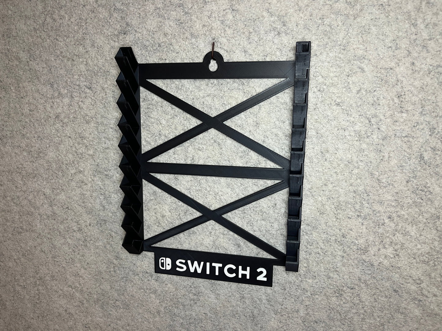 Vägghållare / spelställ för 10 spel till Nintendo Switch 2