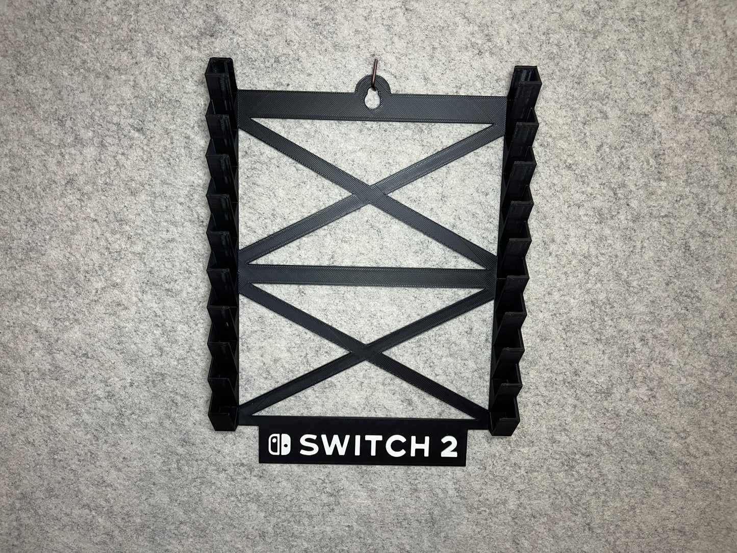Vägghållare / spelställ för 10 spel till Nintendo Switch 2