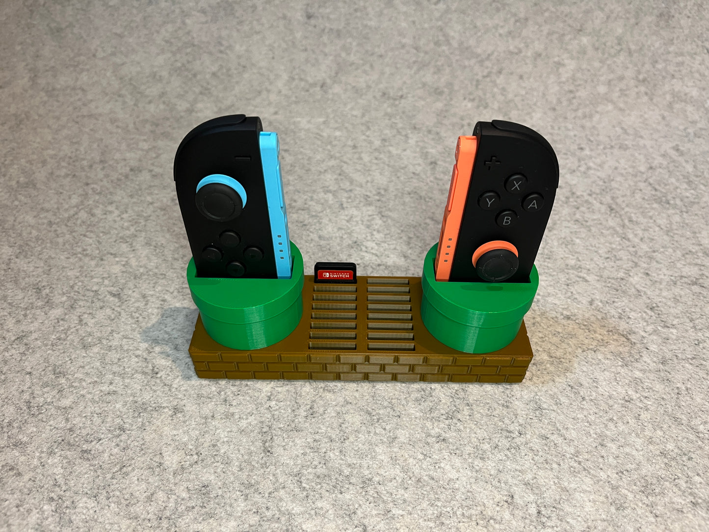 Super Mario ställ för JoyCon och 16 Nintendo Switch 2 spel
