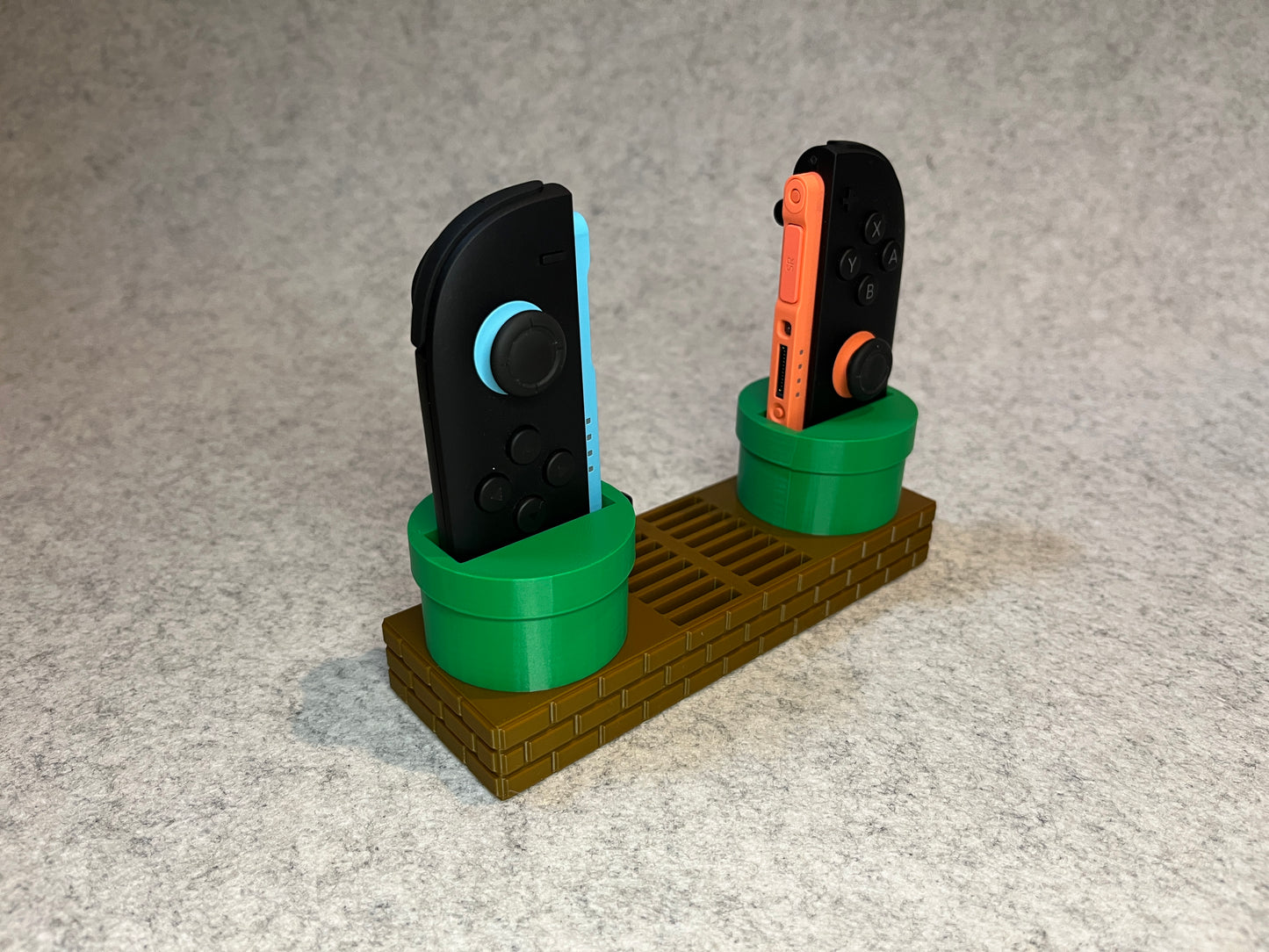 Super Mario ställ för JoyCon och 16 Nintendo Switch 2 spel