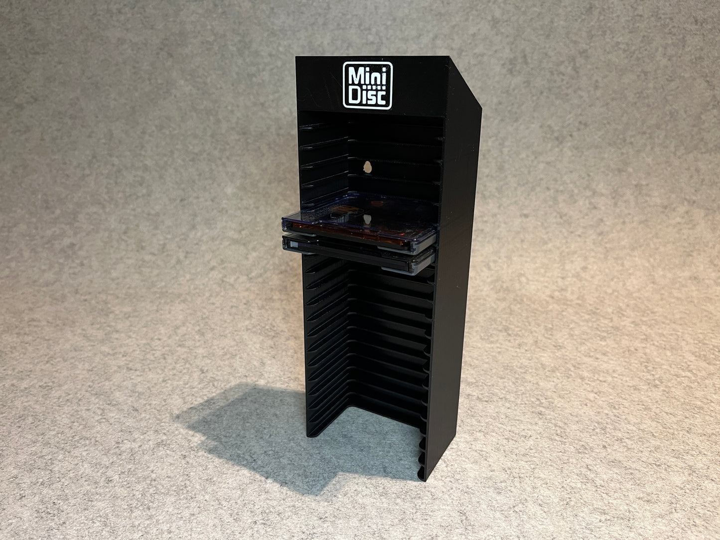 Vägghållare / ställ för 20 MiniDisc MD skivor