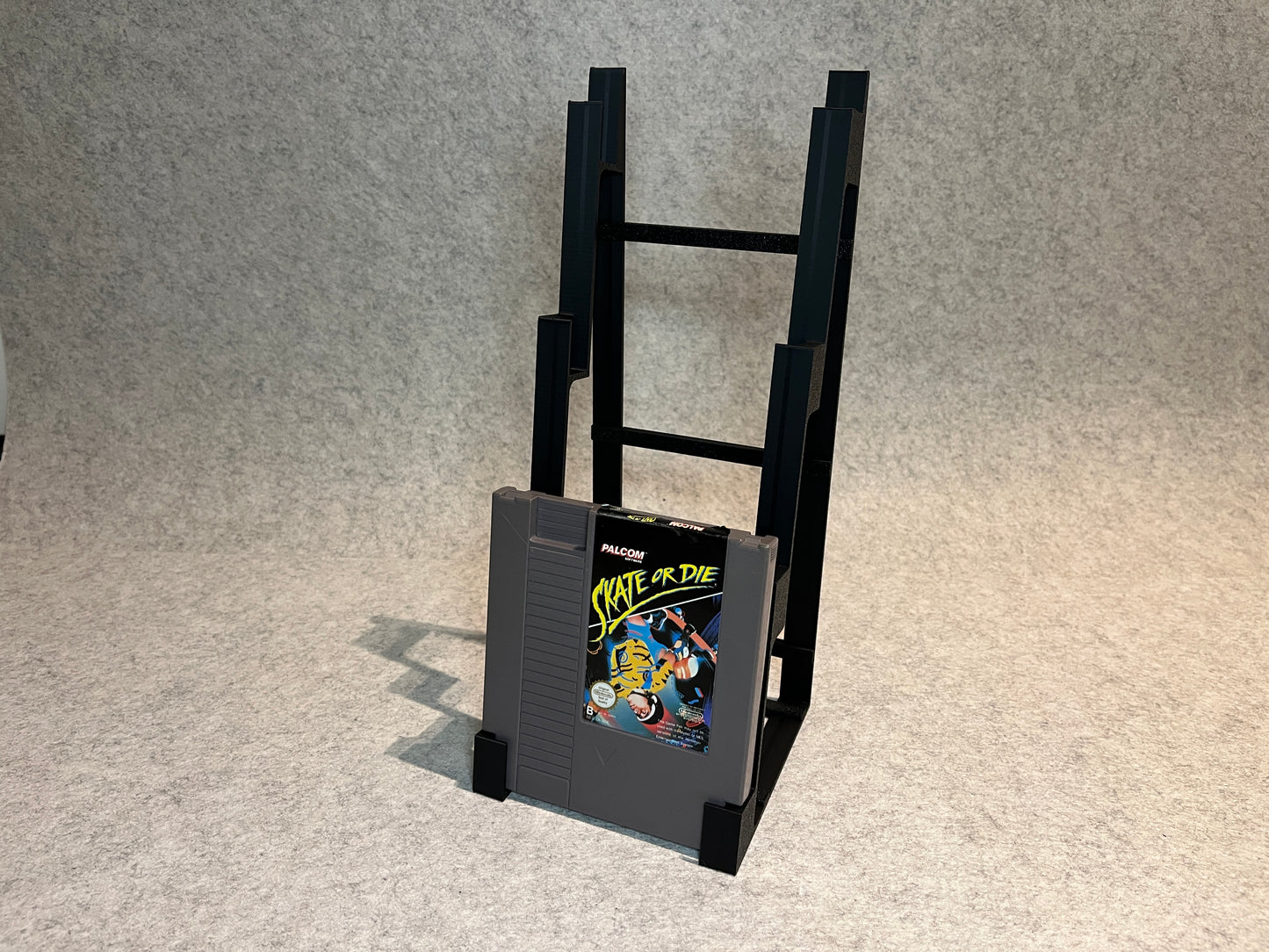 Display spelställ för 4 spel till Nintendo NES