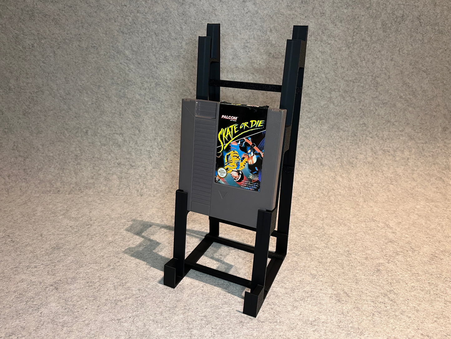 Display spelställ för 4 spel till Nintendo NES