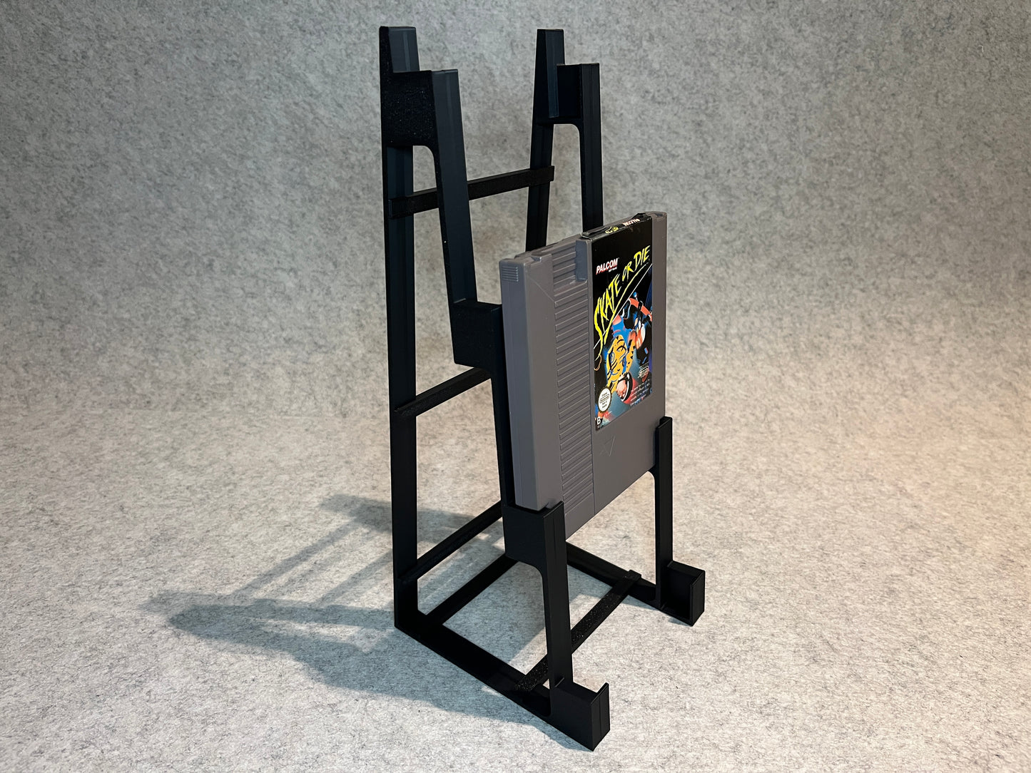 Display spelställ för 4 spel till Nintendo NES