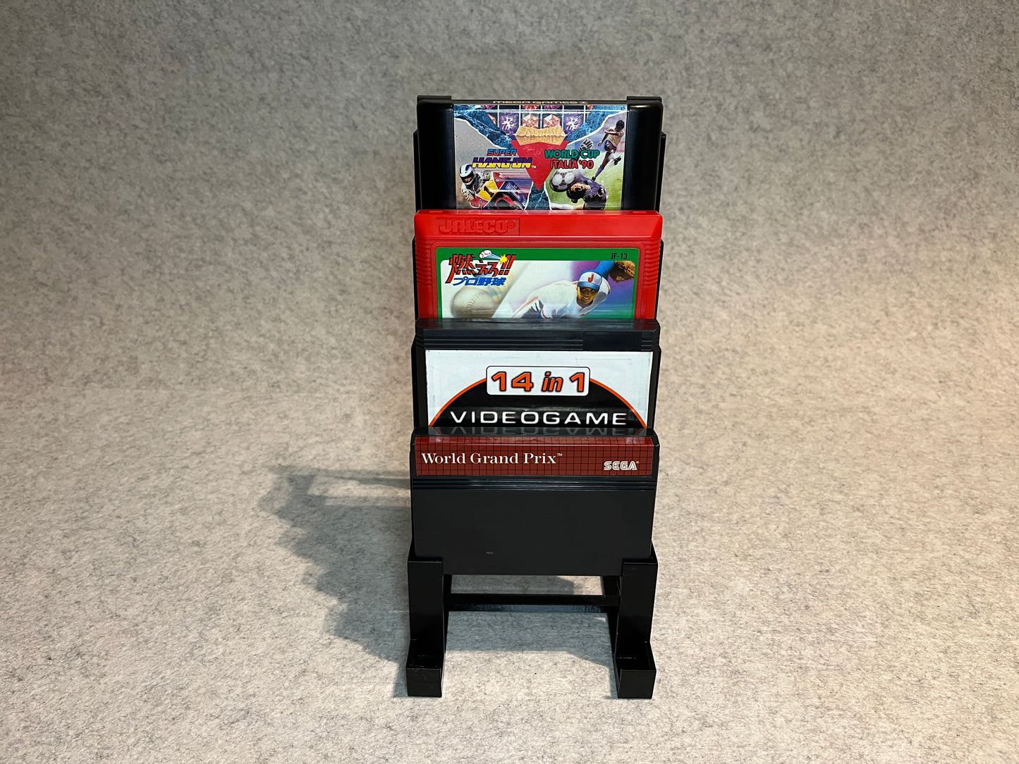 Displayställ för 6 Famicom / Sega Mega Drive / Master System-kassetter