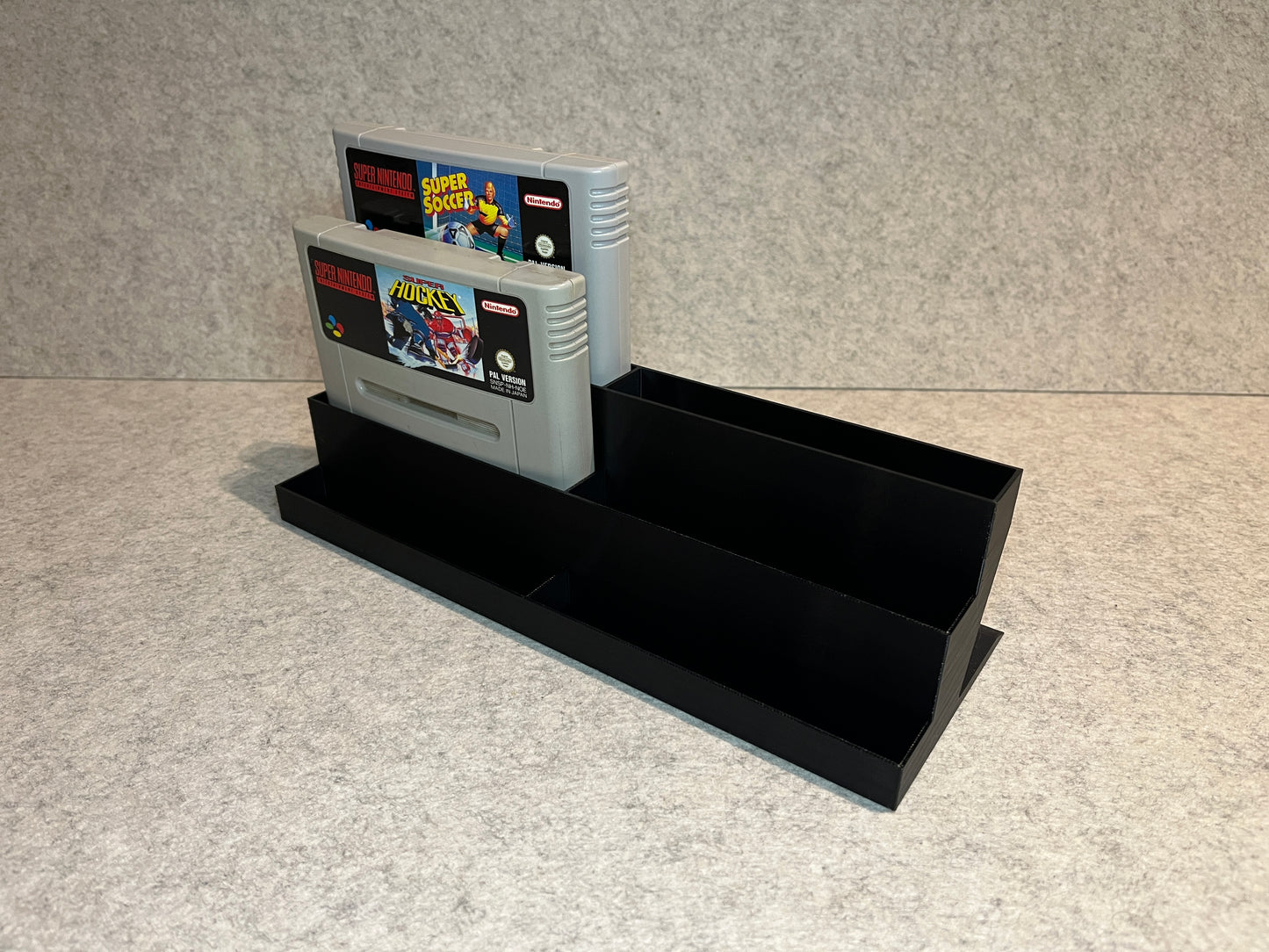 Spelställ för 6 SNES-kassetter - trappstegsdesign