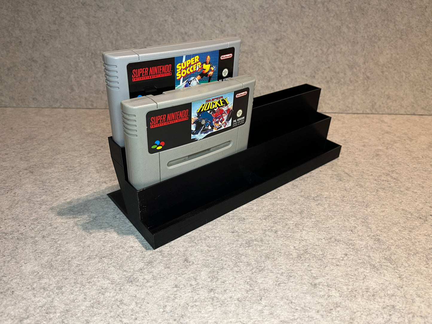 Spelställ för 6 SNES-kassetter - trappstegsdesign
