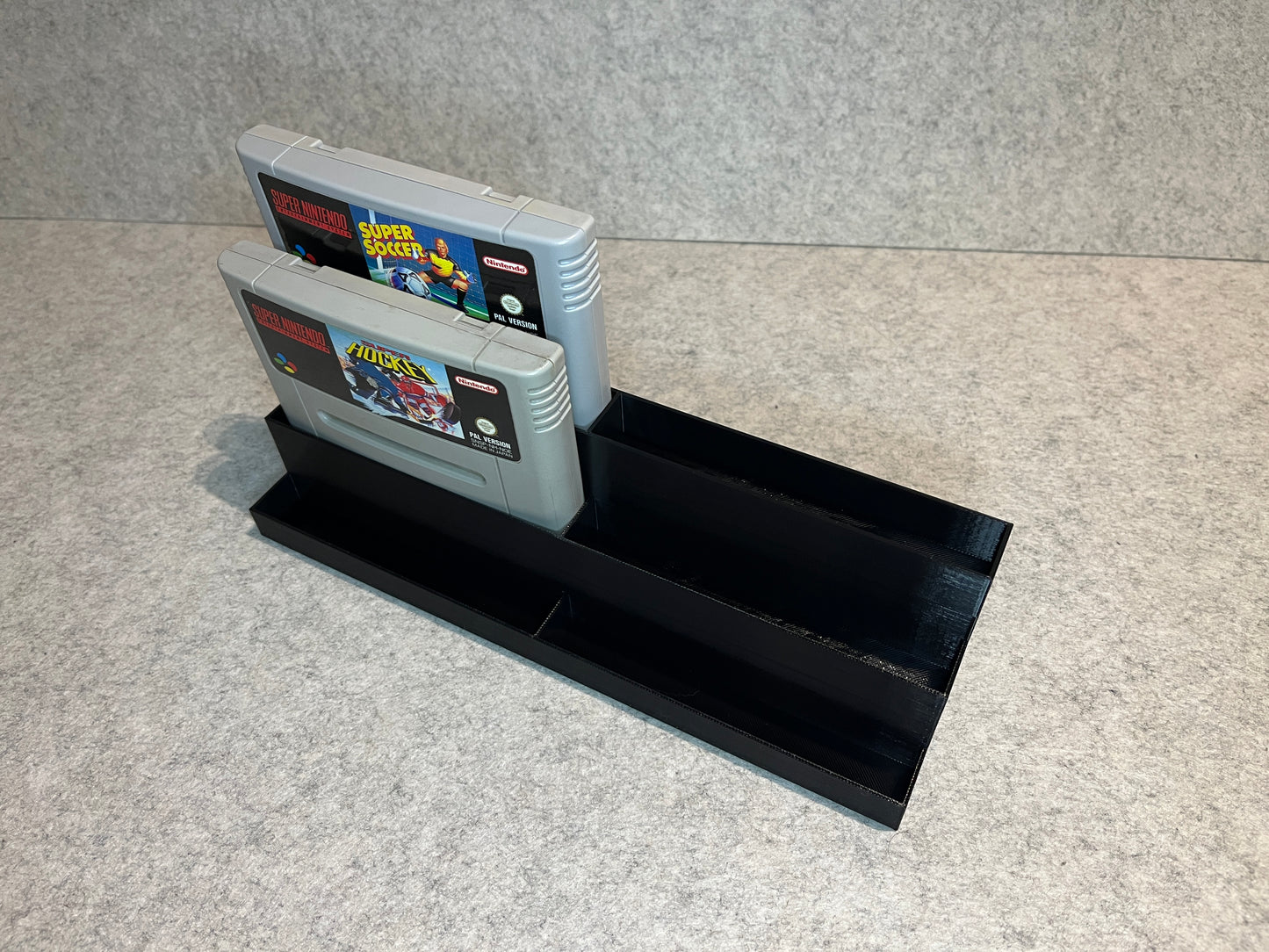 Spelställ för 6 SNES-kassetter - trappstegsdesign