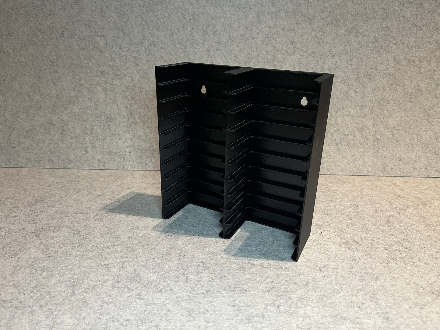 Vägghållare för 20 DAT kassettband