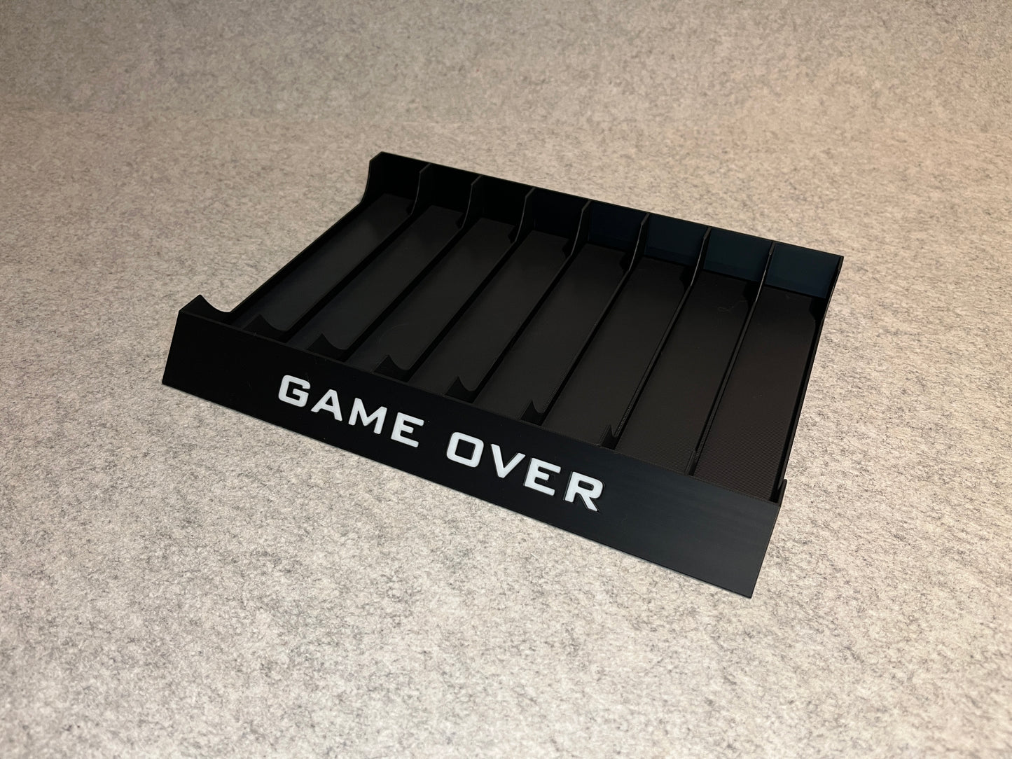 Spelställ för 8 inboxade N64 / SNES-spel - med text „GAME OVER“