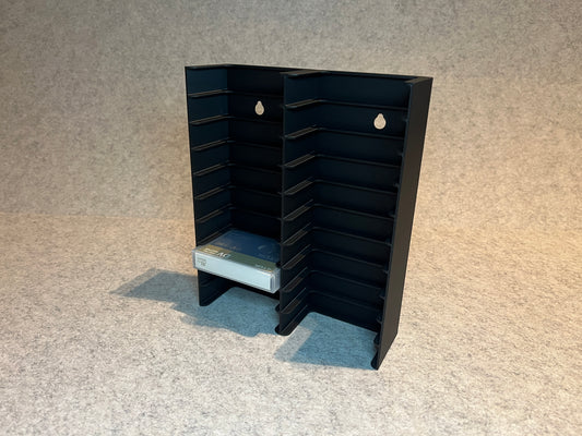 Vägghållare för 20 MiniDV kassettband