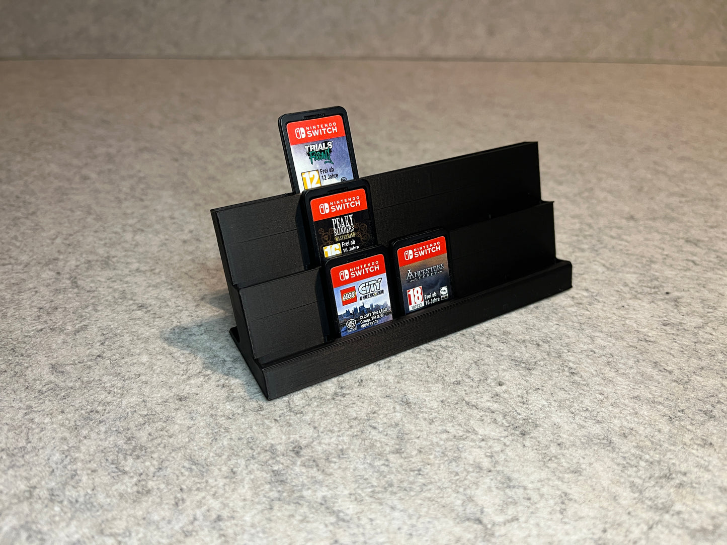 Spelställ för 15 Nintendo Switch spel - trappstegsdesign