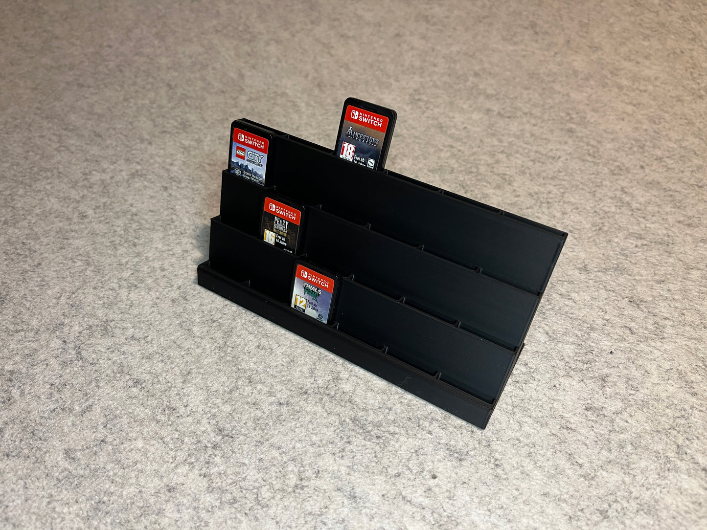 Spelställ för 24 Nintendo Switch cartridge – trappstegsdesign (stort)