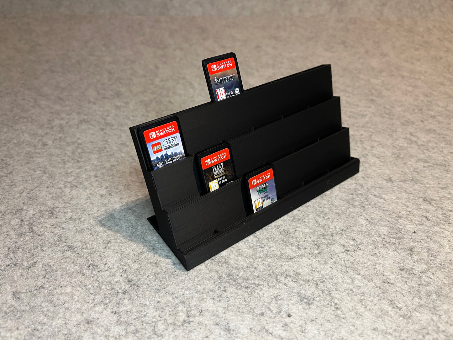 Spelställ för 24 Nintendo Switch cartridge – trappstegsdesign (stort)