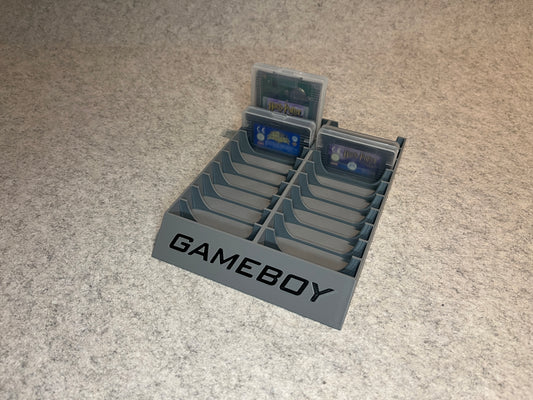 Spelställ för 20 GameBoy spel i skyddsfodral med GAMEBOY text