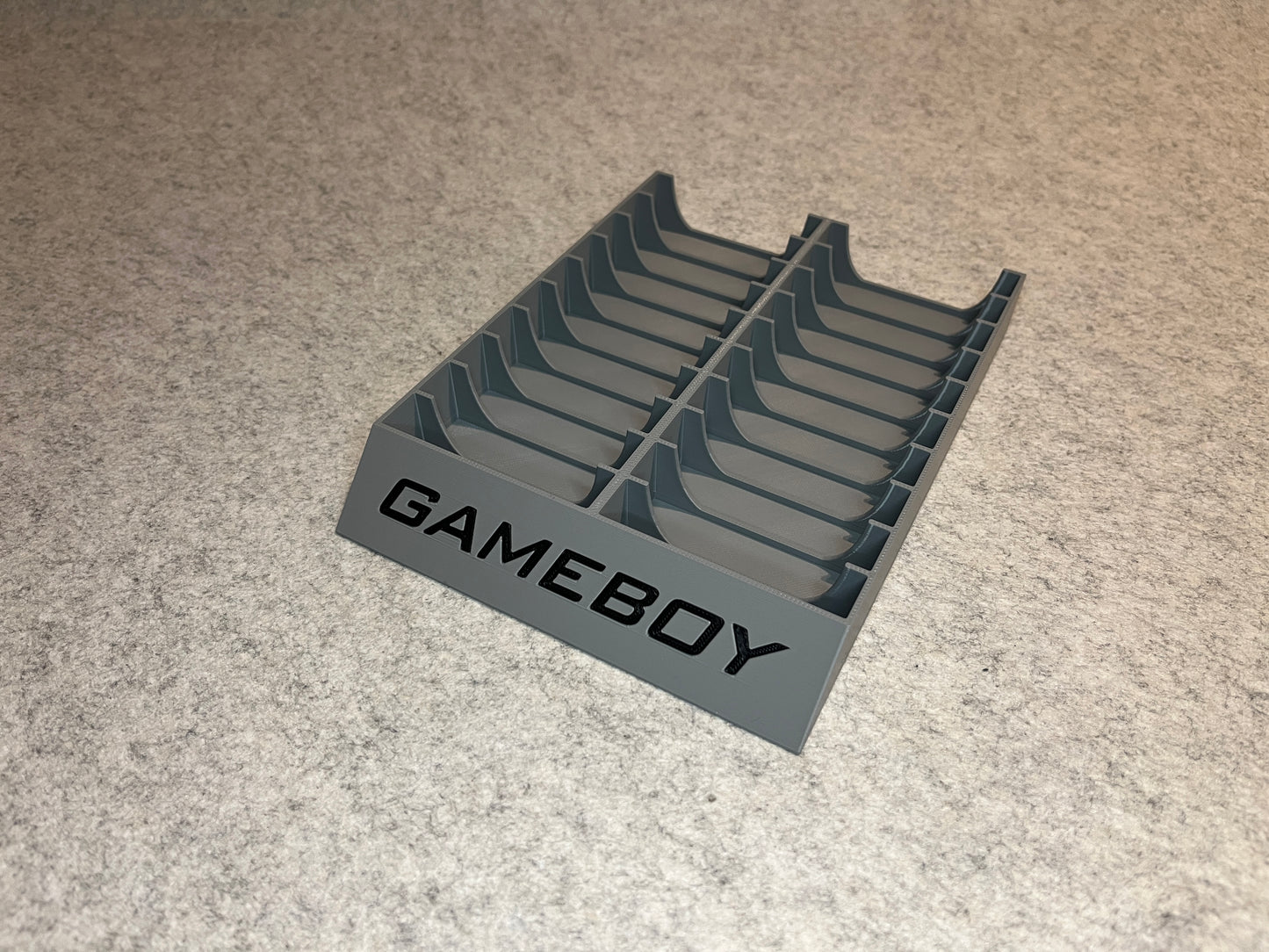 Spelställ för 20 GameBoy spel i skyddsfodral med GAMEBOY text