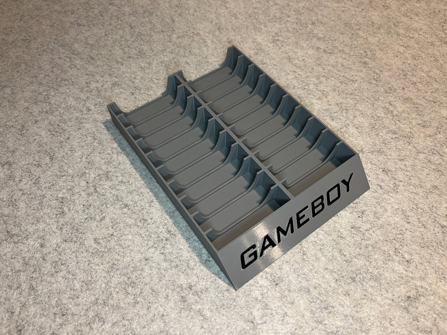 Spelställ för 20 GameBoy spel i skyddsfodral med GAMEBOY text