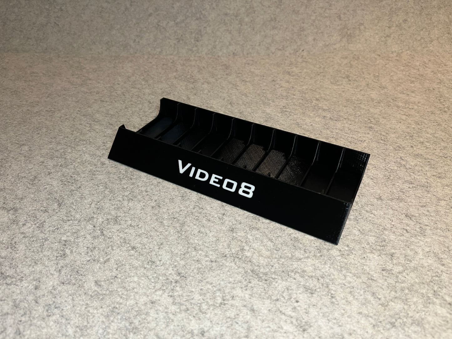 Ställ för 10 Video8 kassettband med VIDEO8 text