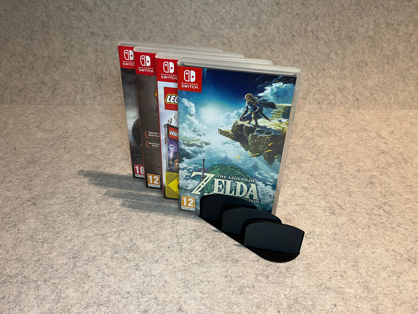 Display ställ för 6 Nintendo Switch spel