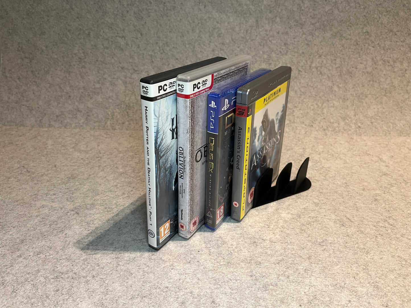 Display ställ för 6 spel eller DVD